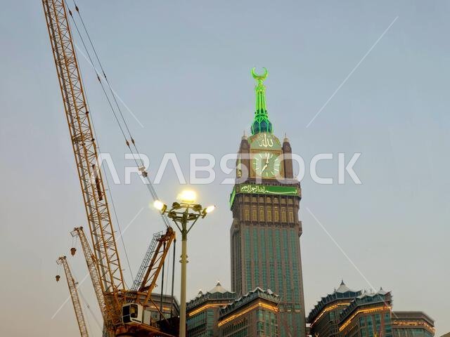 Mecca, Saudi Arabia, June 4 2024: The Clock Towers near Kaaba, a government-owned complex of seven skyscraper hotels in Mecca, a part of King AbdulAzi Mecca, Saudi Arabia, June 4 2024: The Clock Towers near Kaaba, a government-owned complex of seven skyscraper hotels in Mecca, a part of King AbdulAzi