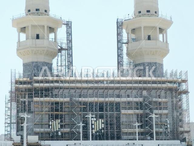 Mecca, Saudi Arabia, June 4 2024: Minarets of Al Masjid Al Haram mosque around the Kaaba in Hajj, pilgrimage, Umrah, with crane towers around it for m Mecca, Saudi Arabia, June 4 2024: Minarets of Al Masjid Al Haram mosque around the Kaaba in Hajj, pilgrimage, Umrah, with crane towers around it for m