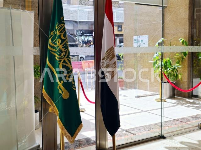 Mecca, Saudi Arabia, June 5 2024: The Arab Republic of Egypt Flag and The Saudi Arabia Kingdom flag in Mecca Makkah al-Mukarramah, Makkah city, The Eg
