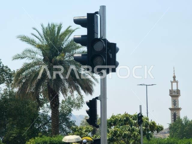 Mecca, Saudi Arabia, June 19 2024: Traffic signals in Saudi Arabia Kingdom streets, highway road car mobility and jam concept, streets of Mecca Makkah