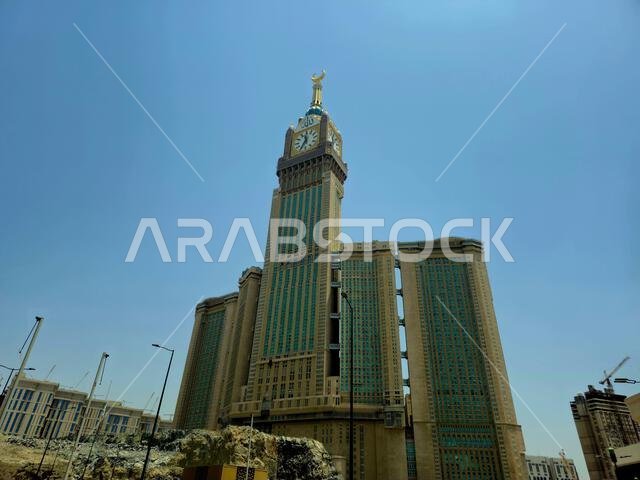Mecca, Saudi Arabia, June 5 2024: The Clock Towers near Kaaba, a government-owned complex of seven skyscraper hotels in Mecca, a part of King AbdulAzi Mecca, Saudi Arabia, June 5 2024: The Clock Towers near Kaaba, a government-owned complex of seven skyscraper hotels in Mecca, a part of King AbdulAzi