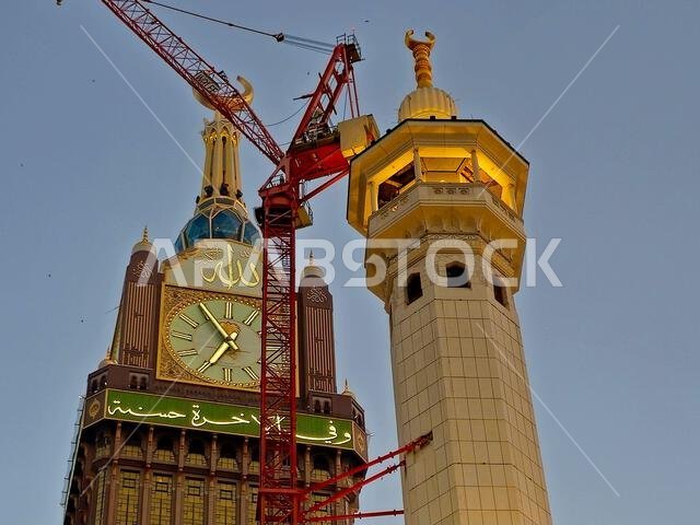 Mecca, Saudi Arabia, June 5 2024: Minarets of Al Masjid Al Haram mosque around the Kaaba in Hajj, pilgrimage, Umrah, with crane towers around it for m