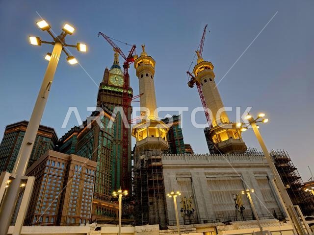 Mecca, Saudi Arabia, June 5 2024: Minarets of Al Masjid Al Haram mosque around the Kaaba in Hajj, pilgrimage, Umrah, with crane towers around it for m Mecca, Saudi Arabia, June 5 2024: Minarets of Al Masjid Al Haram mosque around the Kaaba in Hajj, pilgrimage, Umrah, with crane towers around it for m