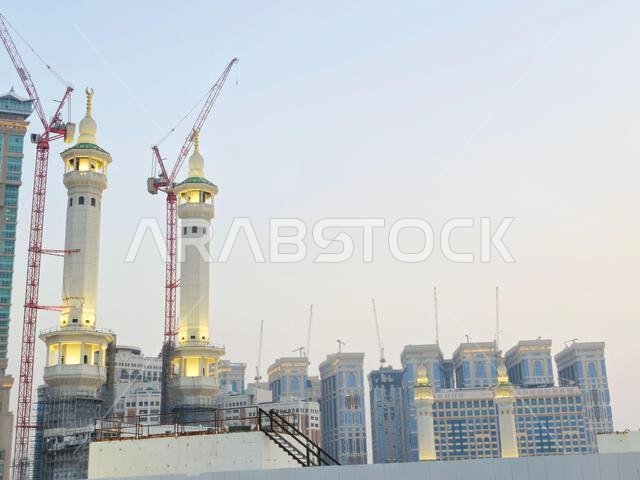 Mecca, Saudi Arabia, June 4 2024: Minarets of Al Masjid Al Haram mosque around the Kaaba in Hajj, pilgrimage, Umrah, with crane towers around it for m Mecca, Saudi Arabia, June 4 2024: Minarets of Al Masjid Al Haram mosque around the Kaaba in Hajj, pilgrimage, Umrah, with crane towers around it for m