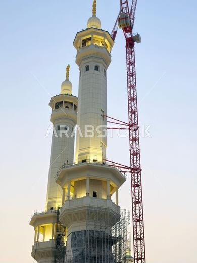 Mecca, Saudi Arabia, June 4 2024: Minarets of Al Masjid Al Haram mosque around the Kaaba in Hajj, pilgrimage, Umrah, with crane towers around it for m Mecca, Saudi Arabia, June 4 2024: Minarets of Al Masjid Al Haram mosque around the Kaaba in Hajj, pilgrimage, Umrah, with crane towers around it for m