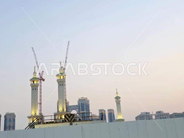 Mecca, Saudi Arabia, June 4 2024: Minarets of Al Masjid Al Haram mosque around the Kaaba in Hajj, pilgrimage, Umrah, with crane towers around it for m Mecca, Saudi Arabia, June 4 2024: Minarets of Al Masjid Al Haram mosque around the Kaaba in Hajj, pilgrimage, Umrah, with crane towers around it for m