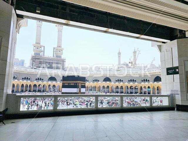 Mecca, Saudi Arabia, June 4 2024: Minarets and Kaaba in Hajj, pilgrimage, Umrah, circumambulating, encircling, walk around the Holy Ka'abah seven time