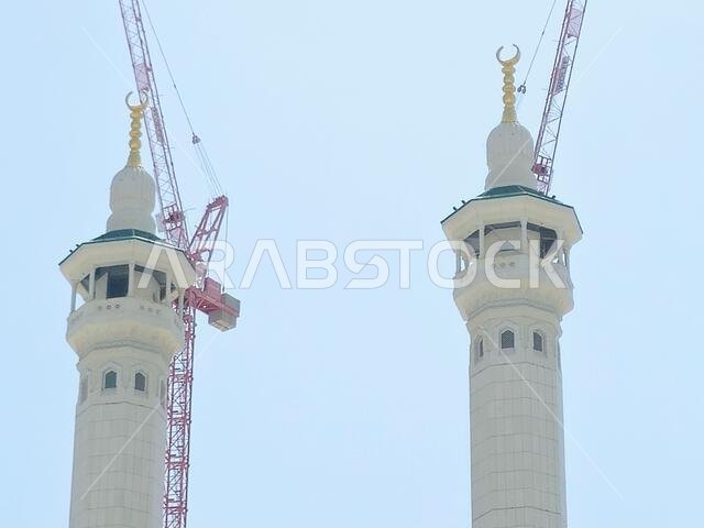 Mecca, Saudi Arabia, June 4 2024: Minarets of Al Masjid Al Haram mosque around the Kaaba in Hajj, pilgrimage, Umrah, with crane towers around it for m Mecca, Saudi Arabia, June 4 2024: Minarets of Al Masjid Al Haram mosque around the Kaaba in Hajj, pilgrimage, Umrah, with crane towers around it for m