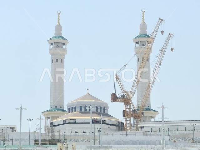 Mecca, Saudi Arabia, June 4 2024: Minarets of Al Masjid Al Haram mosque around the Kaaba in Hajj, pilgrimage, Umrah, with crane towers around it for m Mecca, Saudi Arabia, June 4 2024: Minarets of Al Masjid Al Haram mosque around the Kaaba in Hajj, pilgrimage, Umrah, with crane towers around it for m