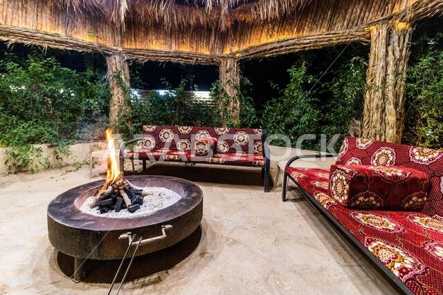 Garden gazebo with a firepit of a home in Sakaka, Saudi Arabia
