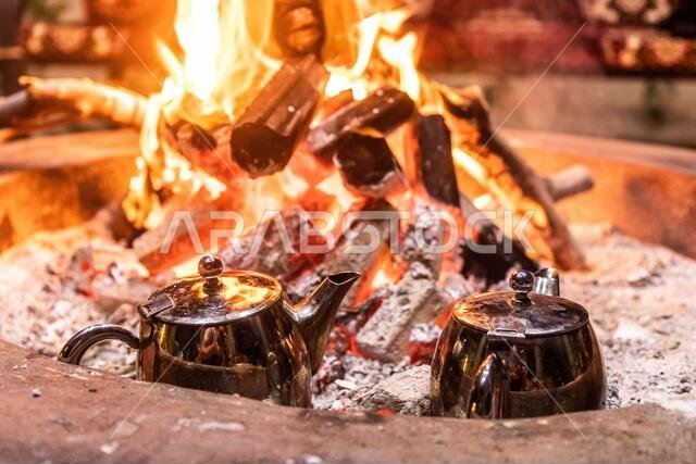 Tea pots on a fire in Saudi Arabia Tea pots on a fire in Saudi Arabia