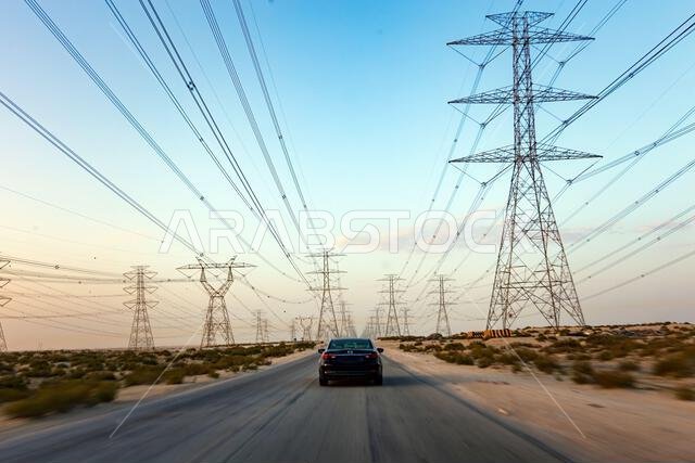 Power Lines Overlook the Road near Al Hofuf, Saudi Arabia
