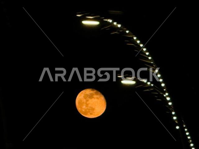 Doha, Qatar. 17th Nov, 2024. A supermoon appears in the skies over Doha, as the last supermoon of 2024 rises over Qatar, Saudi Arabia and the United Arab Emirates. Credit: SOPA Images Limited/Alamy Live News