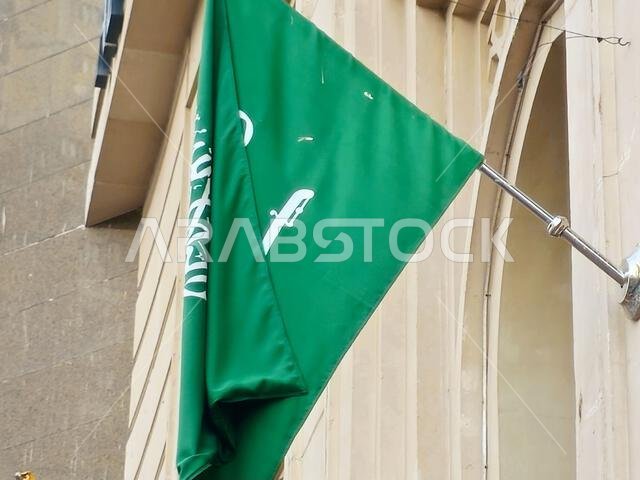 Translation of Arabic Text (There is no God but Allah, and Muhammad is His Prophet), from The national flag of Saudi Arabia kingdom, a green backgroun