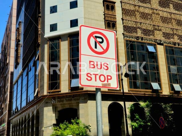 Medina, Saudi Arabia, June 28 2024: A bus stop sign with a no parking area in Madinah city, bus stop is a place where buses stop for passengers to get Medina, Saudi Arabia, June 28 2024: A bus stop sign with a no parking area in Madinah city, bus stop is a place where buses stop for passengers to get