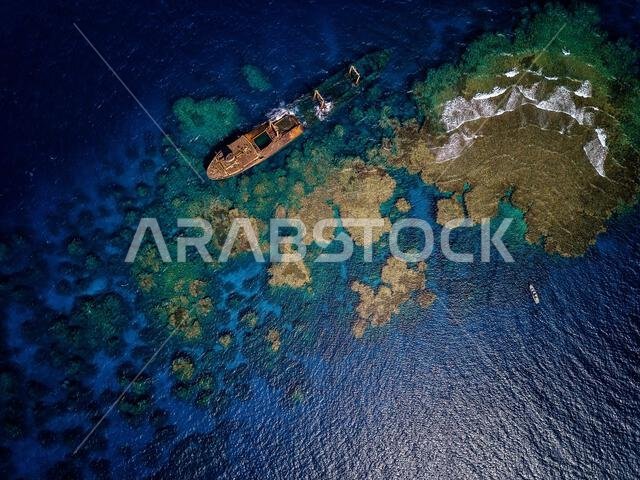 A ship that sank more than forty years ago after colliding with coral reefs while sailing in the Red Sea north of Yanbu Governorate, western Saudia.