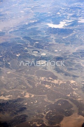 Aerial view of beautiful desert landscapes in the Qaraqir region in Saudi Arabia.