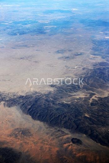 Aerial view of beautiful desert landscapes in the Qaraqir region in Saudi Arabia.