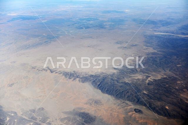 Aerial view of beautiful desert landscapes in the Qaraqir region in Saudi Arabia.
