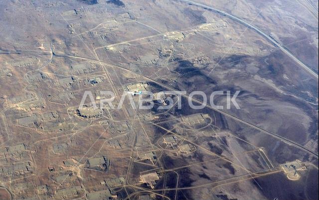 Looking down on an airplane flying over eastern Saudi Arabia.