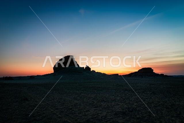 Beautiful Sunset landscape view in Al Sarar desert . Saudi Arabia.