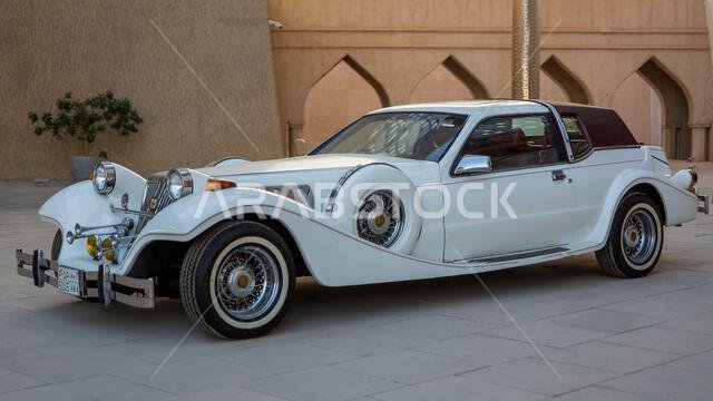 A wide-angle front corner view of a 1986 Zimmer Golden Spirit 2-Door Coupe, taken at a local car show in Qatif City, Saudi Arabia, on December 14, 202