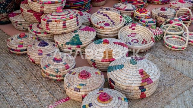Intricately woven handmade Arab baskets crafted by artisans in Oman, showcasing traditional techniques and cultural craftsmanship.