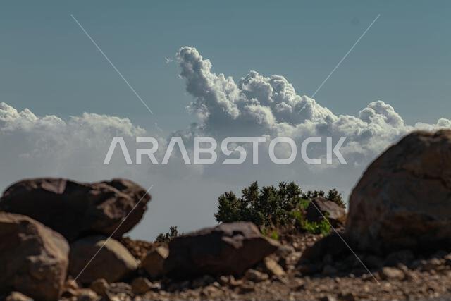 Dramatic Cloud Formation Over Rocky Landscape, Abha, Saudi Arabia