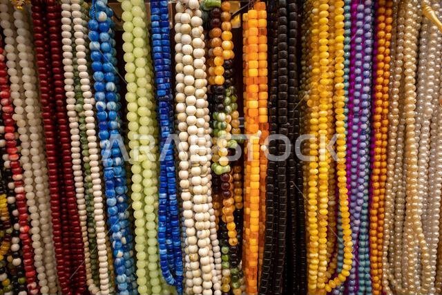 Colorful prayer beads in a market near Medina City, Saudi Arabia, in hajj season.