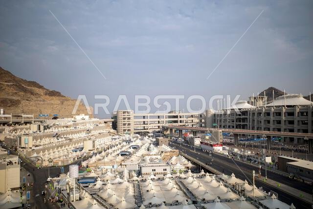 Mecca, Saudi Arabia - June 16, 2024: Buldings and tents for pilgrims during stoning ritual in Mina, Saudi Arabia in the Hajj season.