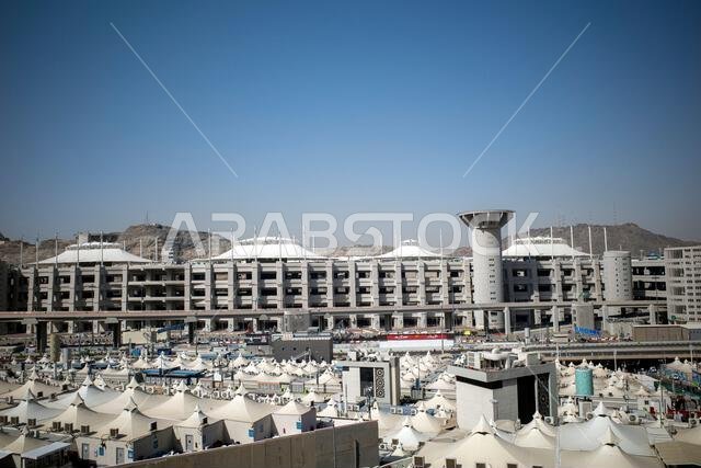 Mecca, Saudi Arabia - June 16, 2024: Buldings and tents for pilgrims during stoning ritual in Mina, Saudi Arabia in the Hajj season.