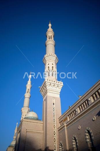 The minarets in Prophet Mosque in Madinah, also known as Masjid Nabawi, Saudi Arabia.