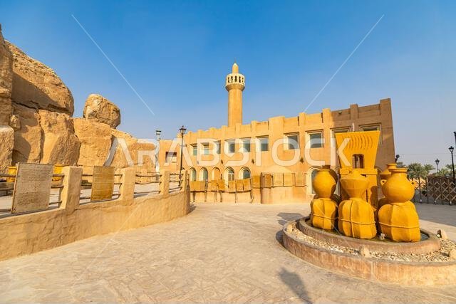 يمثل الطراز المعماري التقليدي الذي يضم مئذنة ونافورة صفراء بالقرب من كهوف جبل القره الصخرية في واحة الأحساء بالمملكة العربية السعودية، نموذجاً فريداً. يمثل الطراز المعماري التقليدي الذي يضم مئذنة ونافورة صفراء بالقرب من كهوف جبل القره الصخرية في واحة الأحساء بالمملكة العربية السعودية، نموذجاً فريداً.