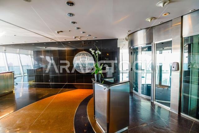 Riyadh , Saudi Arabia - Jannuary 8, 2025: Modern entrance of The Globe, sky-bar restaurant at Kingdom Centre in Riyadh, Saudi Arabia, featuring a