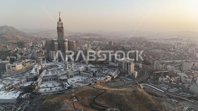Mecca , Saudi Arabia Mars 30 2024: Makkah city Streets hotels and transportation Makkah Clock Tower - Masjid Al Haram drone aerial view