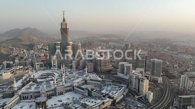 Mecca , Saudi Arabia Mars 30 2024: Makkah city Streets hotels and transportation Makkah Clock Tower - Masjid Al Haram drone aerial view