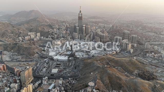 Mecca , Saudi Arabia Mars 30 2024: Makkah city Streets hotels and transportation Makkah Clock Tower - Masjid Al Haram drone aerial view