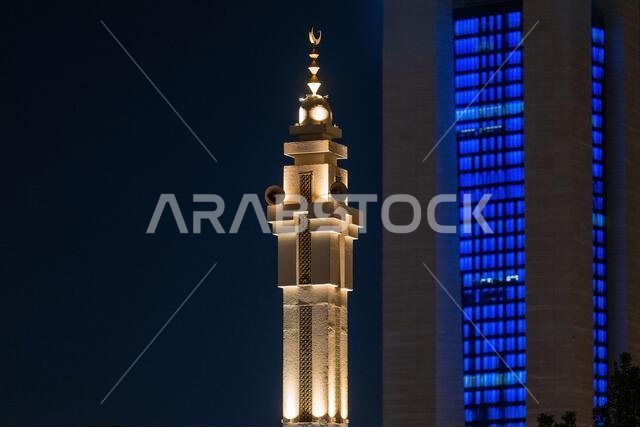 Illuminated Mosque Minaret at Night