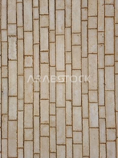 Top-Down, Close-Up of Beige Lime Stone Brick Pavement in Saudi Arabia