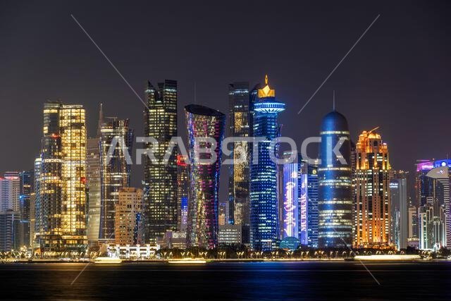 Lantern with dusk sky and Doha Skyline bokeh light background for the Muslim feast of the holy month of Ramadan Kareem