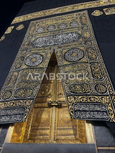 Mecca, Saudi Arabia - May 02, 2024 : The door of the Kaaba called "Multazam" at Grant holy mosque Al-Haram in Mecca Saudi Arabia. Mecca, Saudi Arabia - May 02, 2024 : The door of the Kaaba called "Multazam" at Grant holy mosque Al-Haram in Mecca Saudi Arabia.