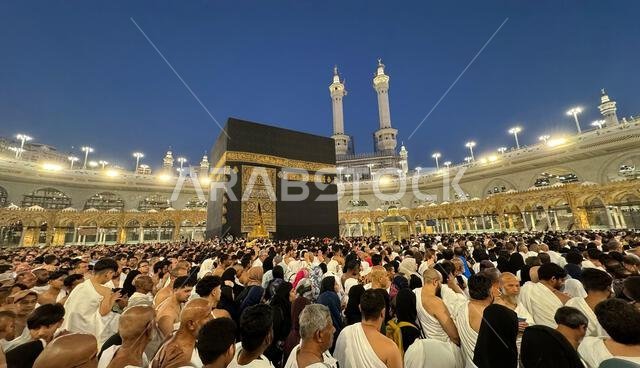 MECCA, SAUDI ARABIA - MAY 02 2024: View on Kaaba from second floor of Masjid Al Haram through some new constructions building around the masjid. High