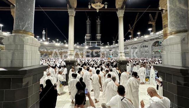 MECCA, SAUDI ARABIA - MAY 02 2024: View on Kaaba from second floor of Masjid Al Haram through some new constructions building around the masjid. High MECCA, SAUDI ARABIA - MAY 02 2024: View on Kaaba from second floor of Masjid Al Haram through some new constructions building around the masjid. High
