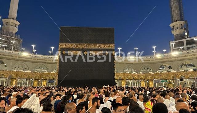 MECCA, SAUDI ARABIA - MAY 02 2024: View on Kaaba from second floor of Masjid Al Haram through some new constructions building around the masjid. High