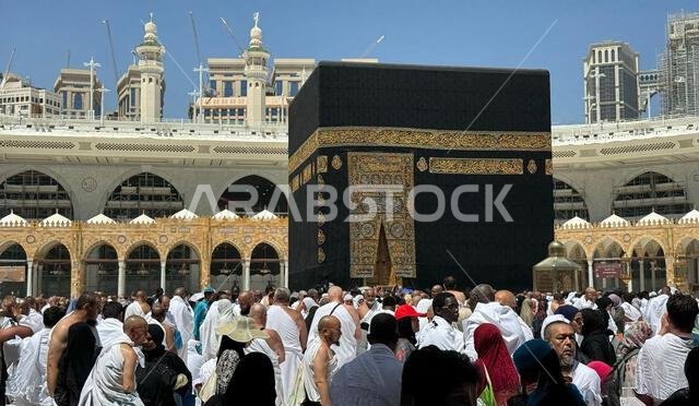 MECCA, SAUDI ARABIA - MAY 02 2024: View on Kaaba from second floor of Masjid Al Haram through some new constructions building around the masjid. High