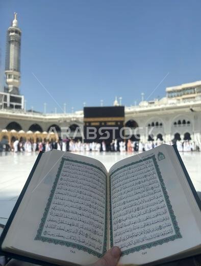 Mekkah, Saudia Arabia, 02 May 2024, A Quran reading in front of the Kaaba at Masjid al-Haram, Mecca, Saudi Arabia. Worshippers perform Tawaf around