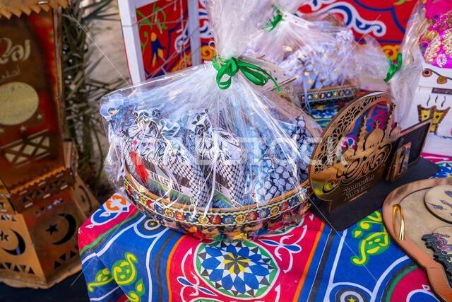 Islamic arts of blue Ramadan lantern as an Arabian Muslim celebration of Ramadan and garangao on oriental red carpet wit