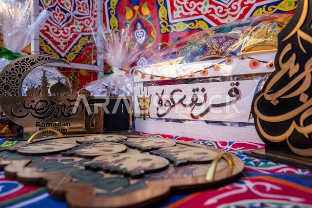 Islamic arts of blue Ramadan lantern as an Arabian Muslim celebration of Ramadan and garangao on oriental red carpet wit