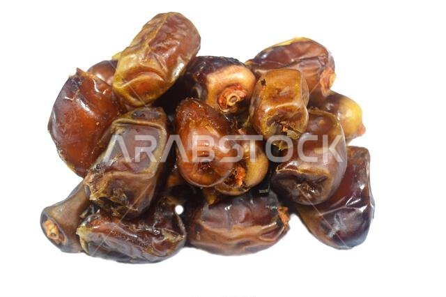 Ajwa dates, a cultivar of the palm date that is widely grown in Medina, Saudi Arabia., an oval-shaped, medium-sized date, often consumed Iftar for Ram