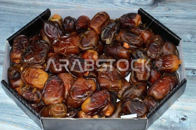 Ajwa dates, a cultivar of the palm date that is widely grown in Medina, Saudi Arabia., an oval-shaped, medium-sized date, often consumed Iftar for Ram